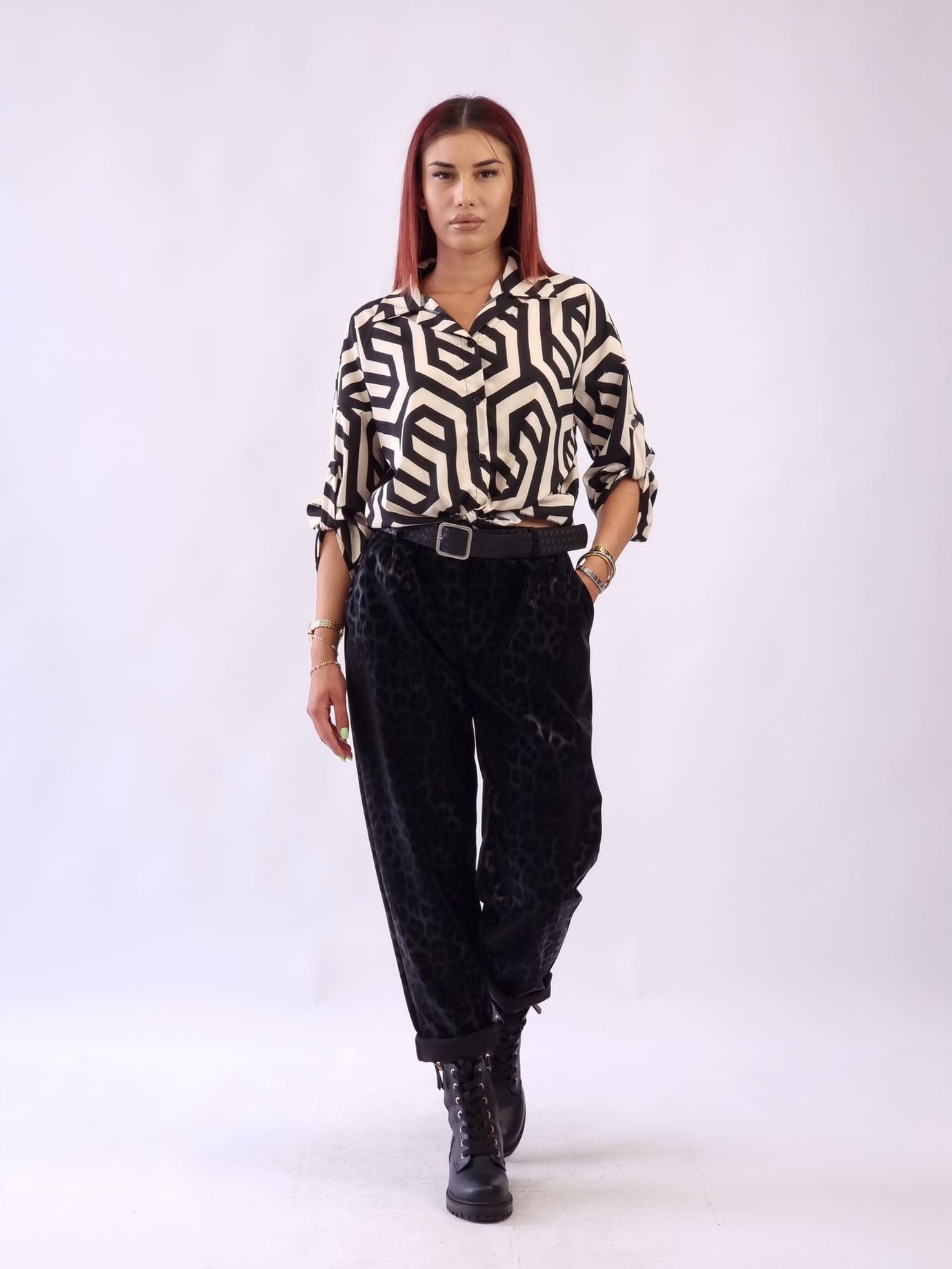 Γυναικείο παντελόνι δερματίνη με εφέ λεοπάρ Μαύρο Γυναικείο παντελόνι δερματίνη με εφέ λεοπάρ Μαύρο