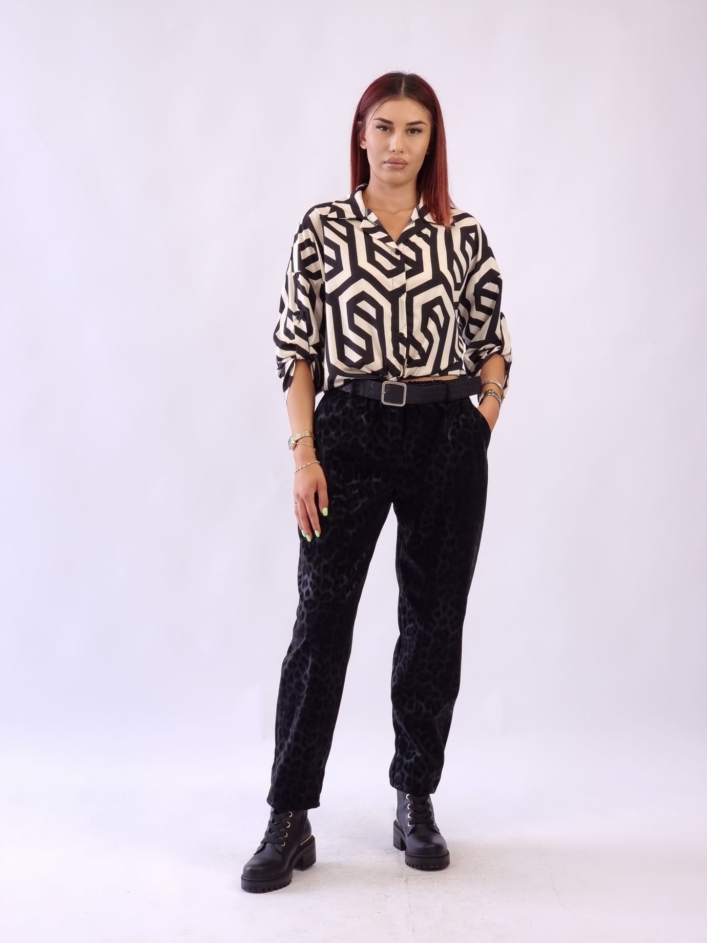 Γυναικείο παντελόνι δερματίνη με εφέ λεοπάρ Μαύρο Γυναικείο παντελόνι δερματίνη με εφέ λεοπάρ Μαύρο