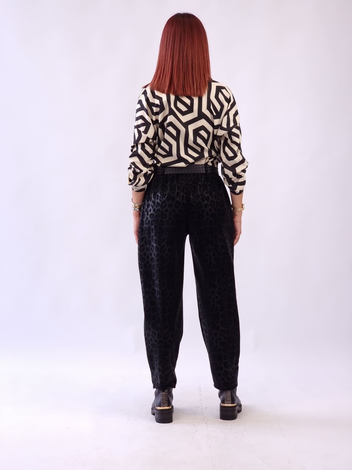 Γυναικείο παντελόνι δερματίνη με εφέ λεοπάρ Μαύρο Γυναικείο παντελόνι δερματίνη με εφέ λεοπάρ Μαύρο