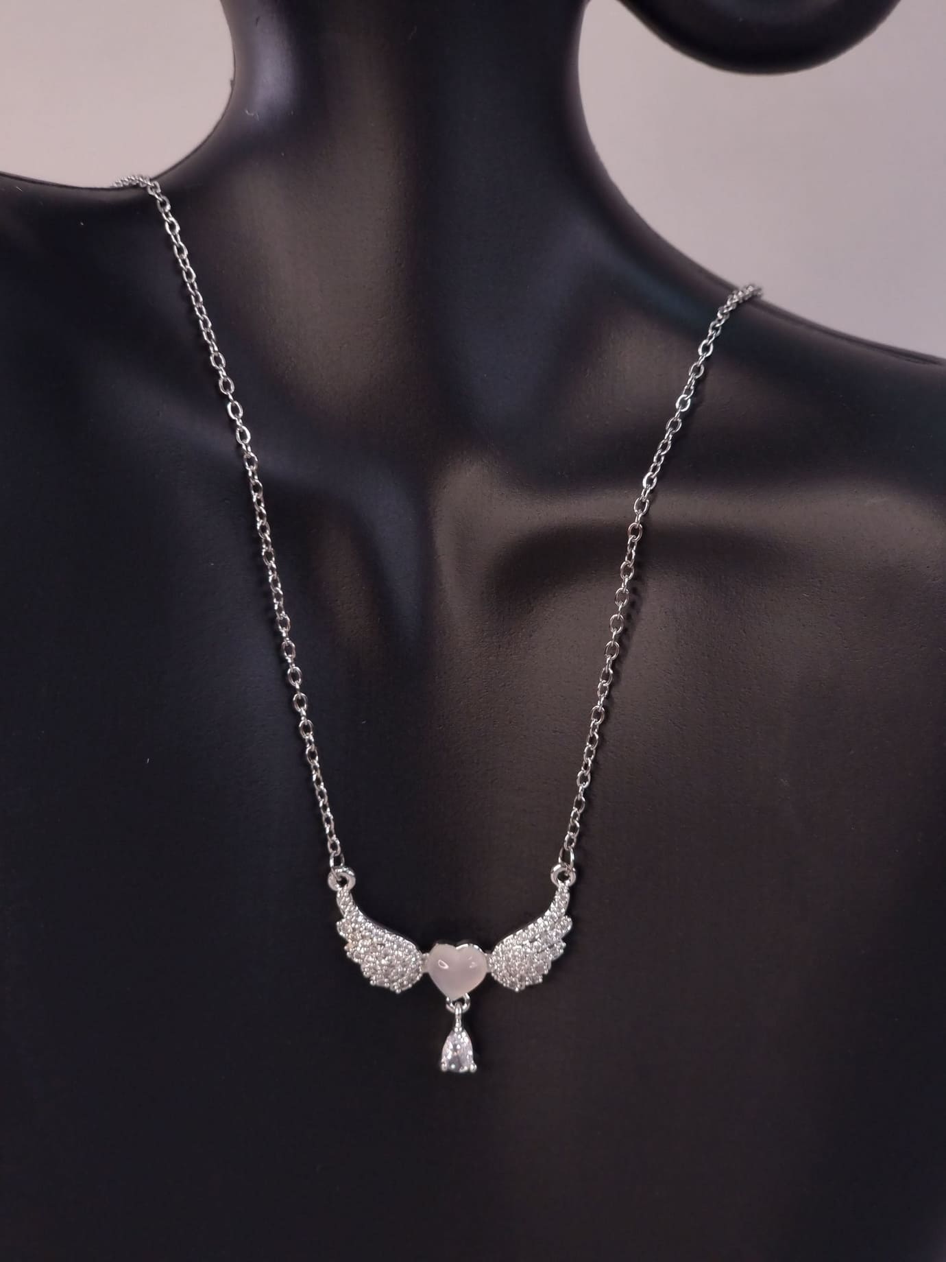 Κολιέ ατσάλι φτερά καρδιά-Ασημί Κολιέ ατσάλι φτερά καρδιά-Ασημί